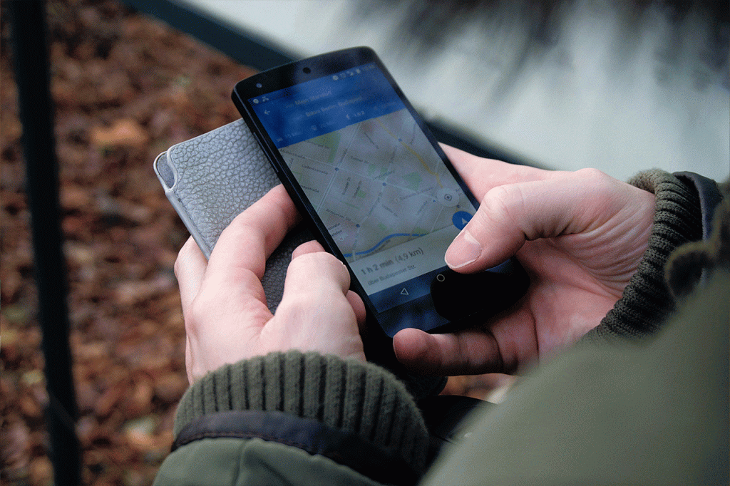 Google Maps photo of guy holding phone