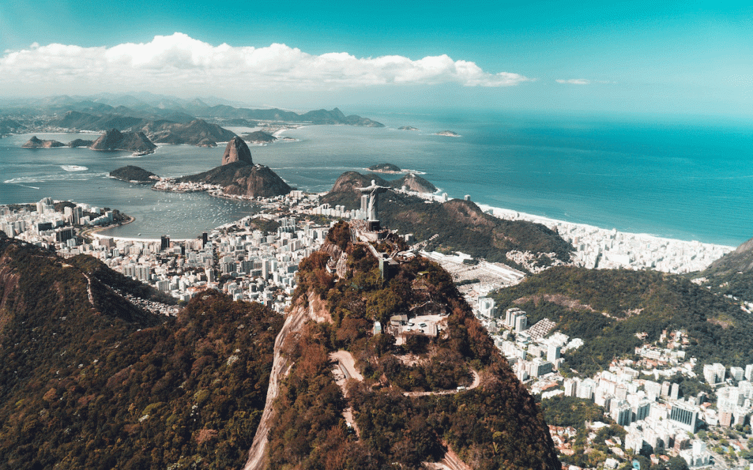 A photo of Rio De Janeiro skyline. Showing the entire zona sul. Including Sugar loaf mountain and the Christ Redentor Statue.