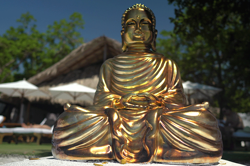 Golden statue decor at bora bora beach club